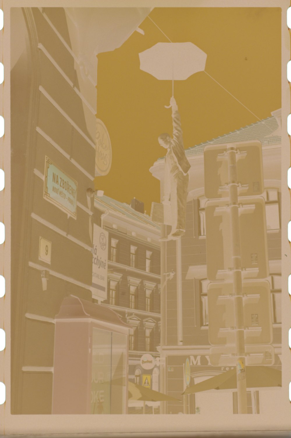 The colour negative as the camera captured it, film borders included: orange and inverted